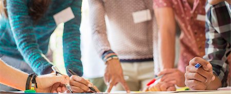 people working together - Hands of creative business people brainstorming in meeting Stock Photo - Premium Royalty-Free, Code: 6113-08087977