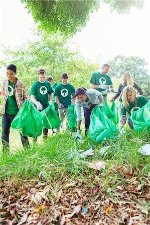 Environmentalist volunteers picking up trash Stock Photo - Premium Royalty-Free, Code: 6113-08088118