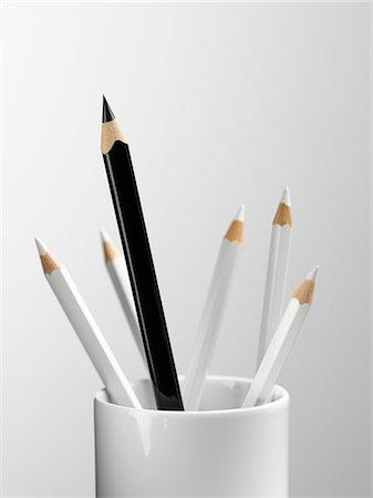 pencil crayon - Tall black pencil in cup with smaller white pencils still life Stock Photo - Premium Royalty-Free, Code: 6113-08088259