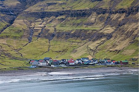 simsearch:6113-07242277,k - Coastal village below green cliffs, Tjornuvik, Faroe Islands Stock Photo - Premium Royalty-Free, Code: 6113-08088354