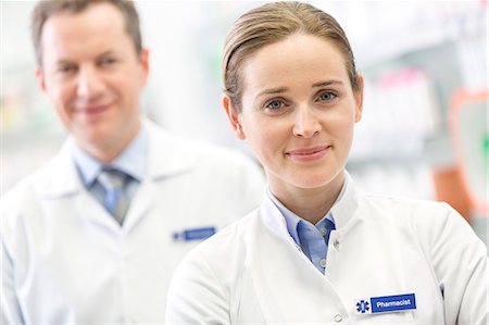 pharmacist looking at camera - Portrait of confident pharmacists Stock Photo - Premium Royalty-Free, Code: 6113-08088400