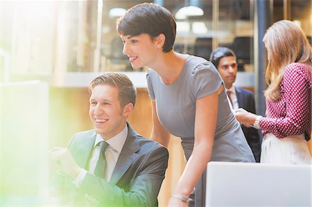 Man Staring at Co-Worker's Underwear - Stock Photo - Masterfile