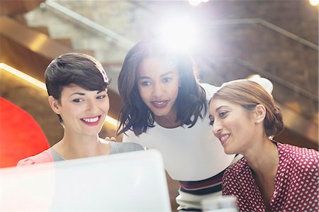 people computer business - Businesswomen using laptop in office Stock Photo - Premium Royalty-Free, Code: 6113-08184278