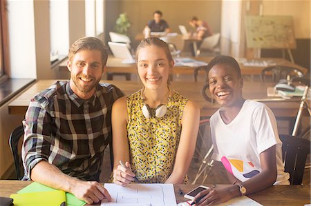 diverse co worker - Portrait smiling creative business people working in office Stock Photo - Premium Royalty-Free, Code: 6113-08105374