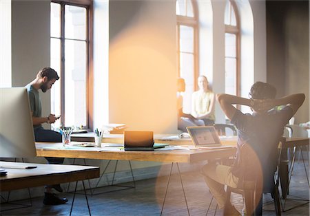 phone young woman computer - Casual business people working in open office Stock Photo - Premium Royalty-Free, Code: 6113-08105403