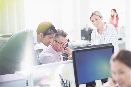 person on computer - Business people working at computer in office Stock Photo - Premium Royalty-Free, Code: 6113-08220262