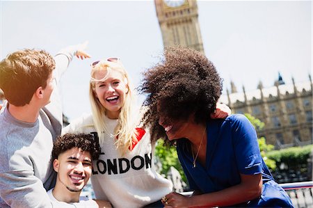 dominican black people - Enthusiastic friends laughing and pointing at Big Ben clocktower, London, United Kingdom Stock Photo - Premium Royalty-Free, Code: 6113-08321177