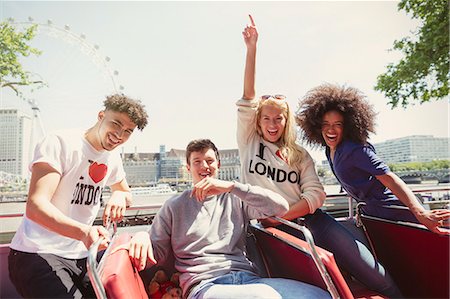 simsearch:6113-08321107,k - Portrait enthusiastic friends riding double-decker bus, London, United Kingdom Photographie de stock - Premium Libres de Droits, Code: 6113-08321127