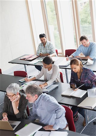 simsearch:6113-08321530,k - Students studying in adult education classroom Stock Photo - Premium Royalty-Free, Code: 6113-08321441