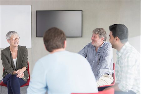 sitting circle - Business people talking in meeting Stock Photo - Premium Royalty-Free, Code: 6113-08321506