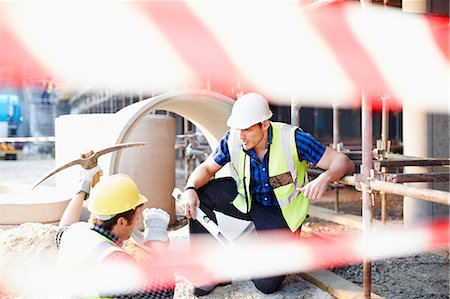 simsearch:6113-08321783,k - Construction workers talking at construction site Stock Photo - Premium Royalty-Free, Code: 6113-08321745