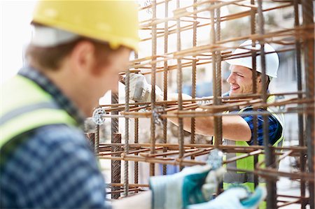 structure (construction) - Constructor workers assembling rebar structure at construction site Stock Photo - Premium Royalty-Free, Code: 6113-08321707