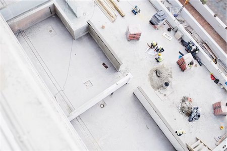 simsearch:6113-08321783,k - Overhead view of construction workers at construction site Stock Photo - Premium Royalty-Free, Code: 6113-08321738