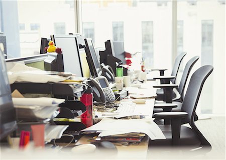 Messy row of desks in office Stock Photo - Premium Royalty-Free, Code: 6113-08549959