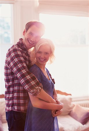 simsearch:649-08543868,k - Portrait smiling couple hugging Stock Photo - Premium Royalty-Free, Code: 6113-08550094