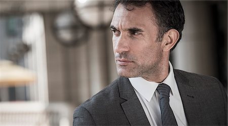 person thinking uncertain - Close up pensive corporate businessman looking away Stock Photo - Premium Royalty-Free, Code: 6113-08568668