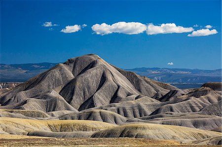 Blue sky and clouds over Badlands, Colorado, United States Stock Photo - Premium Royalty-Free, Code: 6113-08568708