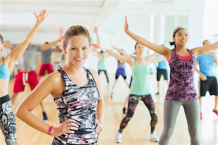 simsearch:6113-08536110,k - Portrait smiling woman in exercise class Stock Photo - Premium Royalty-Free, Code: 6113-08536175