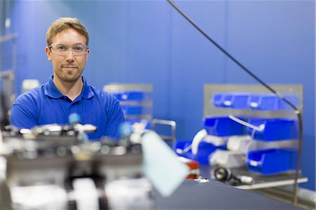 Portrait confident worker in steel factory Stock Photo - Premium Royalty-Free, Code: 6113-08655308