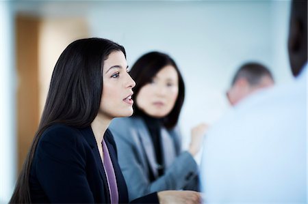 simsearch:6124-09229117,k - Businesswoman talking in meeting Stock Photo - Premium Royalty-Free, Code: 6113-08659656