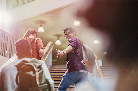 simsearch:6113-07542497,k - College students ascending stairway Photographie de stock - Premium Libres de Droits, Code: 6113-08769647