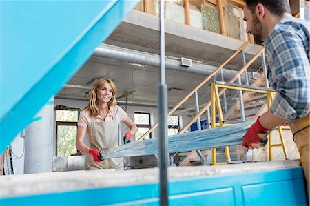 Artists placing stained glass in kiln in studio Stock Photo - Premium Royalty-Free, Code: 6113-08784343