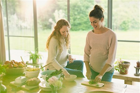 pregnant woman working - Pregnant women preparing food Stock Photo - Premium Royalty-Free, Code: 6113-08722025