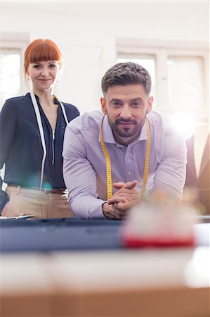 Portrait confident tailors in menswear workshop Stock Photo - Premium Royalty-Free, Code: 6113-08722312