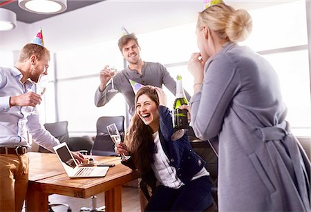 simsearch:6113-07731371,k - Business people drinking champagne, celebrating birthday in conference room Stock Photo - Premium Royalty-Free, Code: 6113-08882758