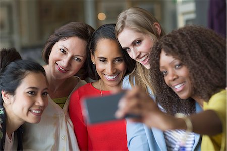 simsearch:614-08877808,k - Women friends taking selfie with camera phone Stock Photo - Premium Royalty-Free, Code: 6113-08805352