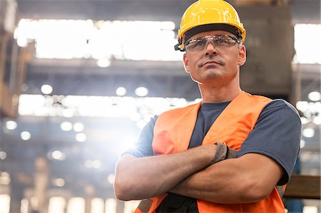 safety worker - Portrait serious confident steel worker in factory Stock Photo - Premium Royalty-Free, Code: 6113-08805557