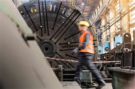 simsearch:6113-07565427,k - Steel worker walking in factory Stock Photo - Premium Royalty-Free, Code: 6113-08805591