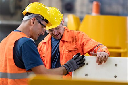 safety equipment - Workers examining part in factory Stock Photo - Premium Royalty-Free, Code: 6113-08805594