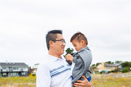 simsearch:649-06432444,k - Chinese father holding son in park Stock Photo - Premium Royalty-Free, Code: 6113-08943826