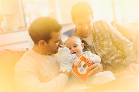 simsearch:6108-08663387,k - Male gay parents with puppet playing with baby son Foto de stock - Sin royalties Premium, Código: 6113-08947265