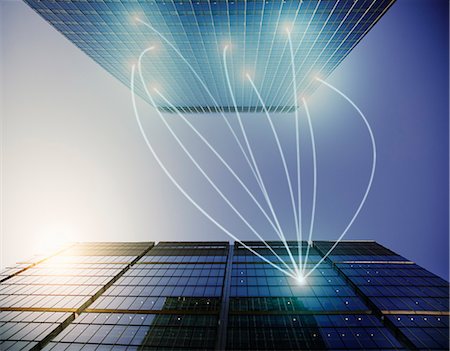 simsearch:649-07279548,k - Fiber optic light trail communication connecting highrise buildings, concept Stock Photo - Premium Royalty-Free, Code: 6113-08985929