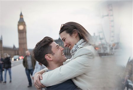 simsearch:6113-07543591,k - Romantic, affectionate couple tourists hugging near Big Ben, London, UK Stock Photo - Premium Royalty-Free, Code: 6113-08986090