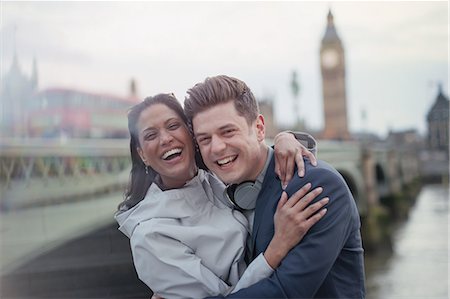 simsearch:649-09061651,k - Portrait enthusiastic, laughing couple tourists standing at Westminster Bridge, London, UK Stock Photo - Premium Royalty-Free, Code: 6113-08986091