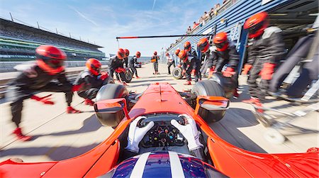 Pit crew ready for formula one race car in pit stop Stock Photo - Premium Royalty-Free, Code: 6113-08927787