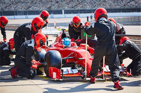 pit - Pit crew working on formula one race car in pit lane Stock Photo - Premium Royalty-Free, Code: 6113-08927804