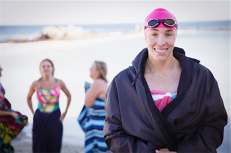 swimmer (female) - Portrait smiling, confident female open water swimmer Stock Photo - Premium Royalty-Free, Code: 6113-09058371