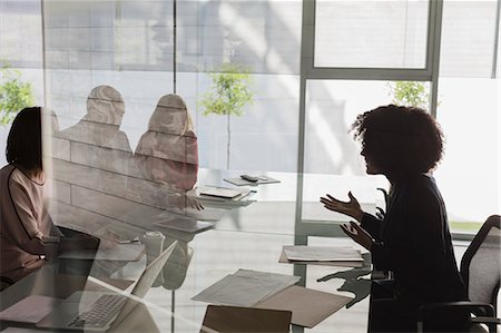 simsearch:6113-09058702,k - Businesswoman leading conference room meeting Stock Photo - Premium Royalty-Free, Code: 6113-09058628
