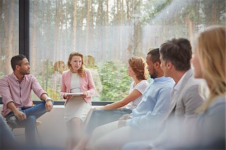 diverse people circle - Therapist leading group therapy session Stock Photo - Premium Royalty-Free, Code: 6113-09058793