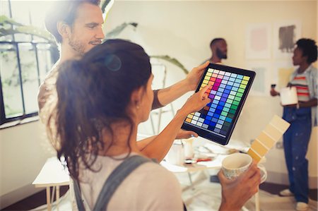 simsearch:6113-09059323,k - Friends with digital tablet viewing digital paint swatches, painting living room Stock Photo - Premium Royalty-Free, Code: 6113-09059337