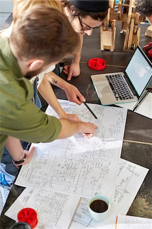 project (a specific task) - Designers meeting, reviewing plans in workshop Stock Photo - Premium Royalty-Free, Code: 6113-09005222