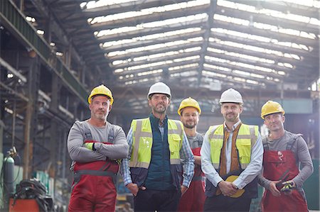 Portrait confident engineers and workers in factory Stock Photo - Premium Royalty-Free, Code: 6113-09027521