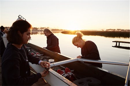 sport - Female rowers preparing scull at sunrise lakeside Stock Photo - Premium Royalty-Free, Code: 6113-09144547