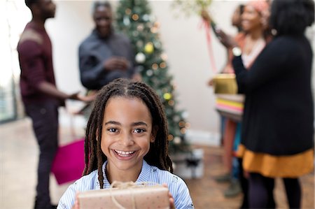 simsearch:614-06624568,k - Portrait smiling girl with Christmas gift Stock Photo - Premium Royalty-Free, Code: 6113-09144681
