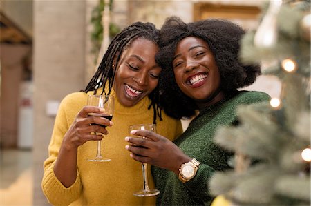 simsearch:6124-09177991,k - Portrait smiling, happy mother and daughter hugging, drinking wine Stock Photo - Premium Royalty-Free, Code: 6113-09144632