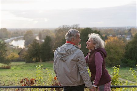 Smiling, affectionate active senior couple in autumn park Stockbilder - Premium RF Lizenzfrei, Bildnummer: 6113-09157583